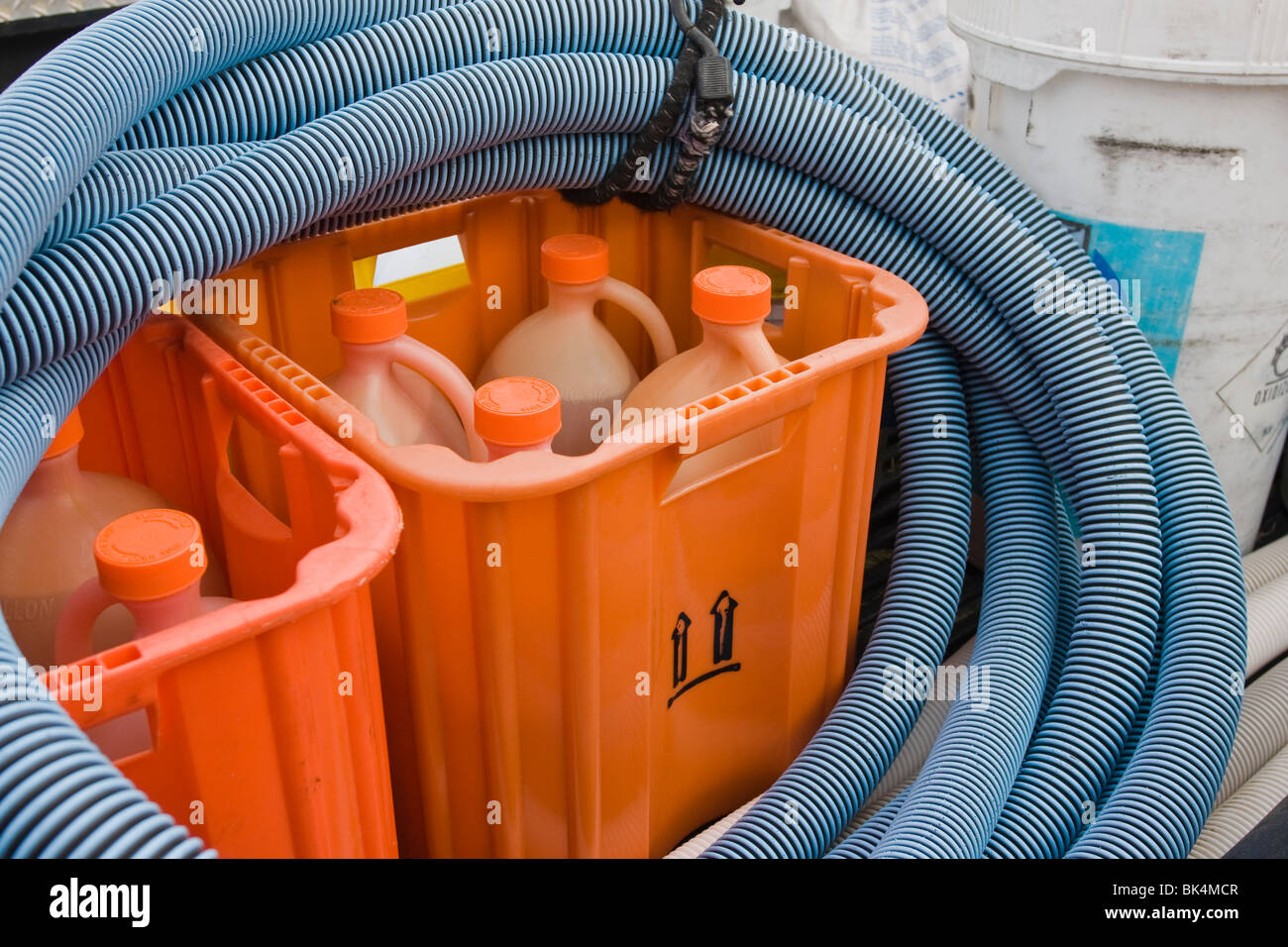 Swimming pool chemicals and cleaning equipment Stock Photo Alamy