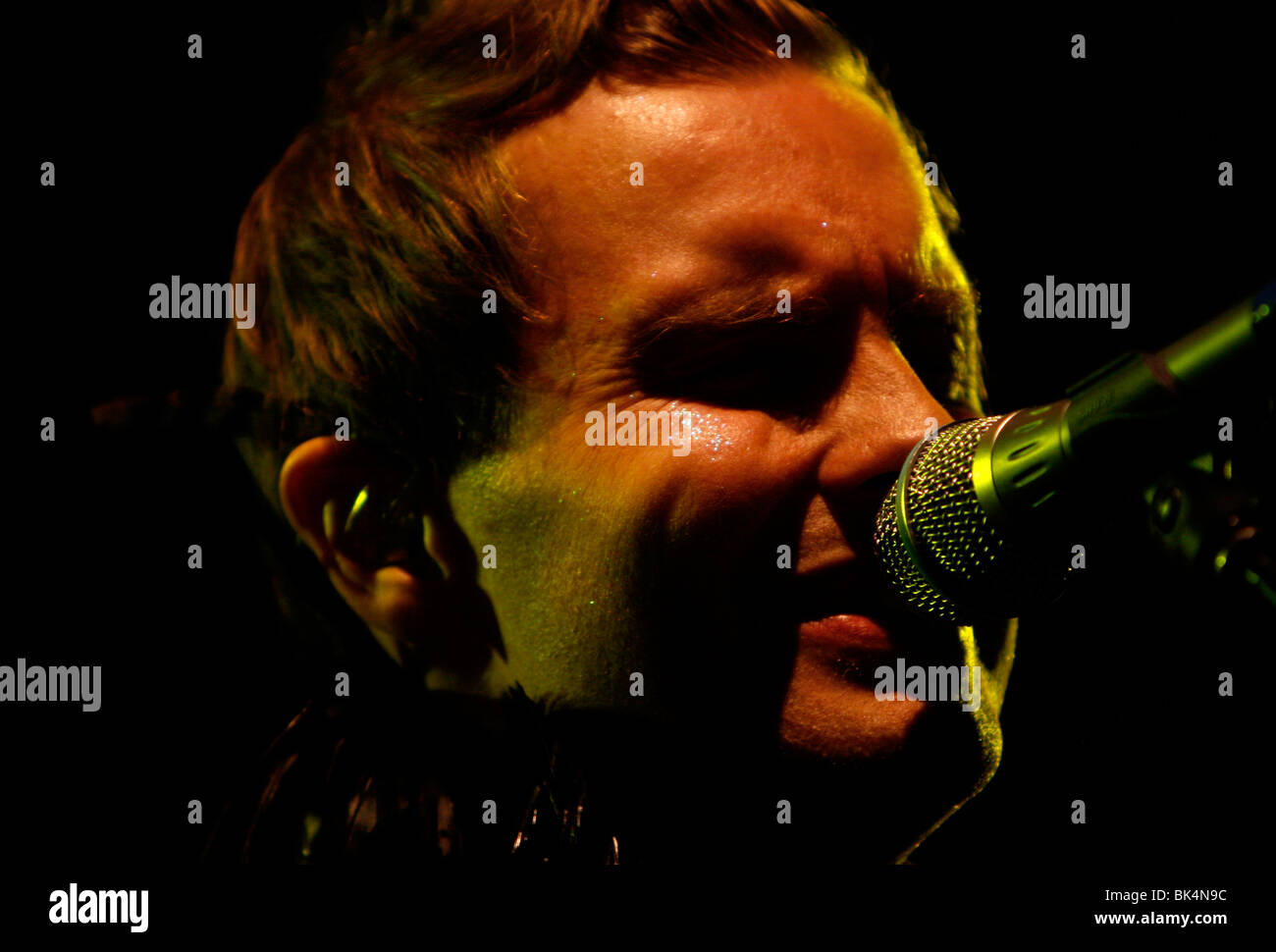 Jon Birgisson of Sigur Ros performs during a concert. Stock Photo
