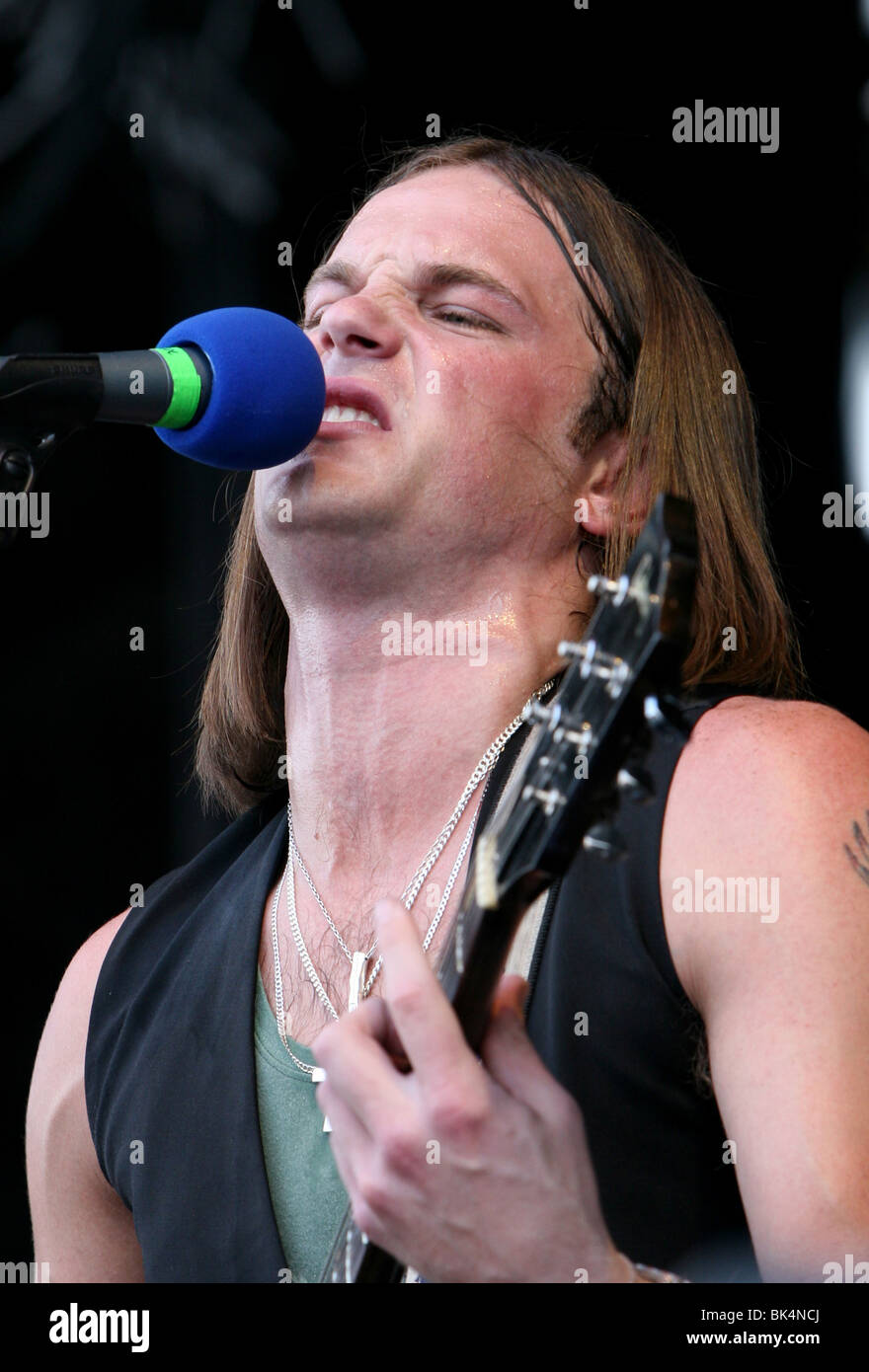 Caleb Bollowill of Kings of Leon performs during a concert. Stock Photo