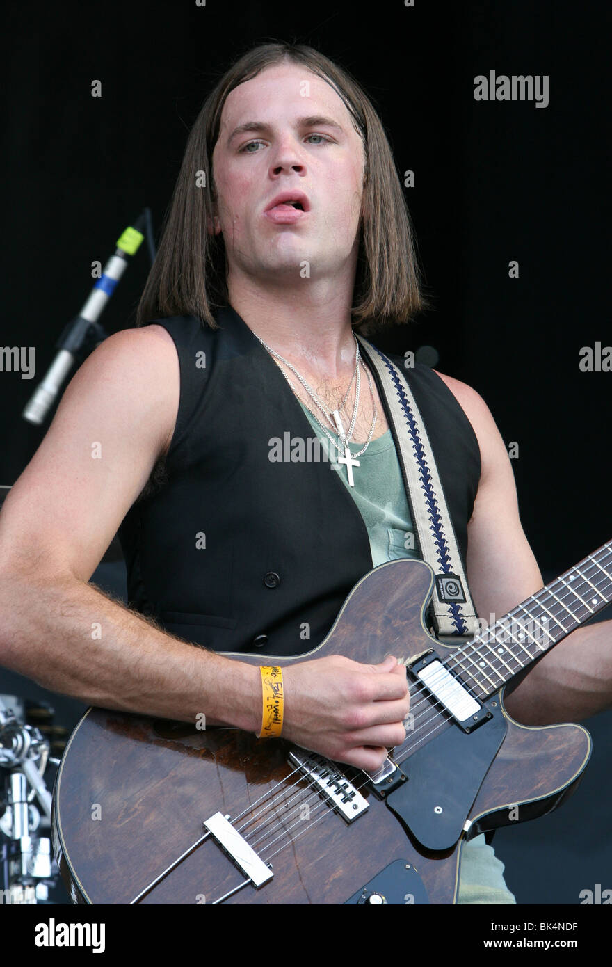 Caleb Bollowill of Kings of Leon performs during a concert. Stock Photo
