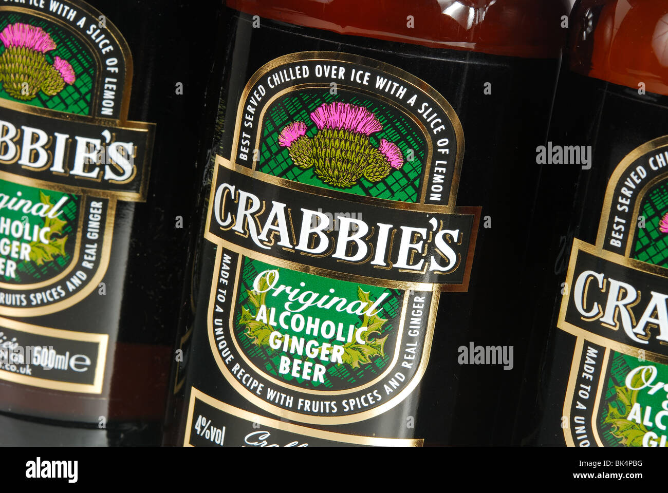 A close-up image of bottles of Crabbie's Original alcoholic ginger beer. Stock Photo