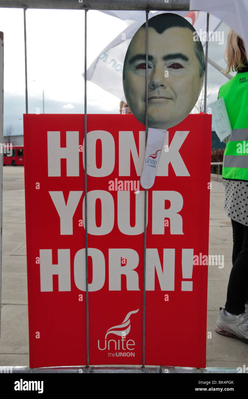 Protest banner and Willie Walsh face mask at a British Airways cabin