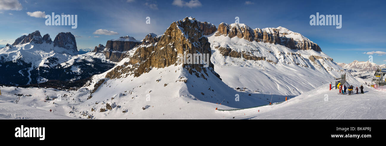 panoramic image of Dolomites mountains in winter, Italy, Belvedere ski area with view over the Gruppo Sella and Sassolungo Stock Photo