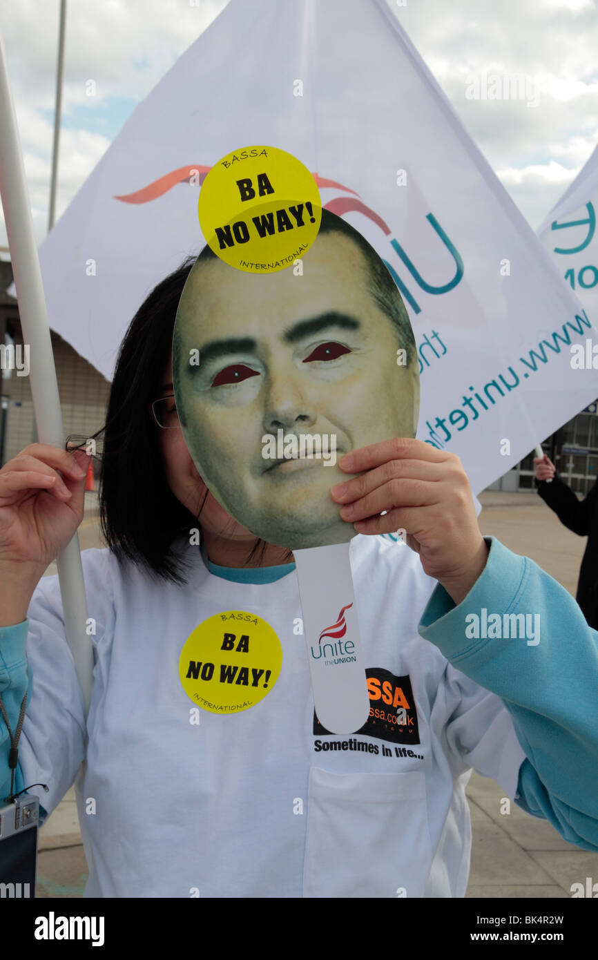 Protester holding Willie Walsh face mask at British Airways cabin crew