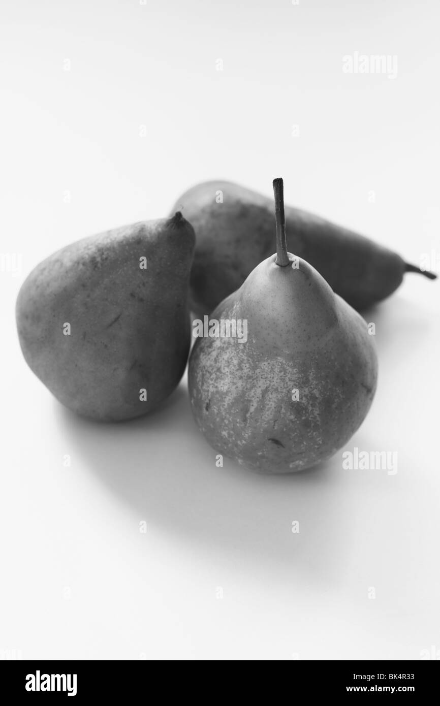 A still life image of three pears in black & white. Stock Photo