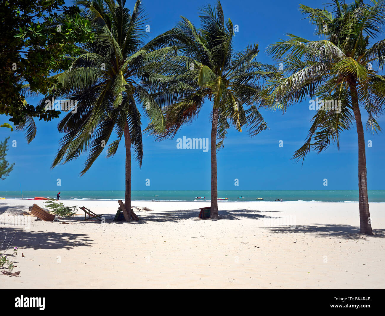 Thailand unspoilt and deserted tropical beach with palm trees and white sand. Khao Kalok, Hua Hin, Pranburi, Thailand, Asia Stock Photo