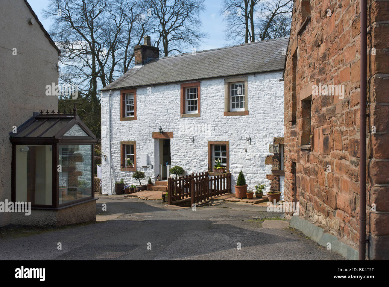 Whitewashed cottage in the village of Kirkoswald, Eden Valley, Cumbria