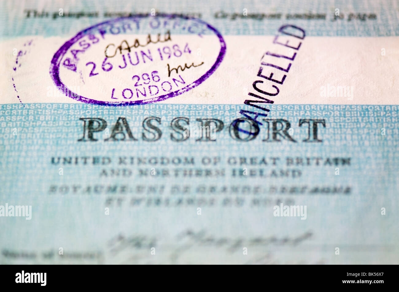 Close-up canceled stamp of British, English passport dated 1984, London, European, Europe, EU, UK Stock Photo