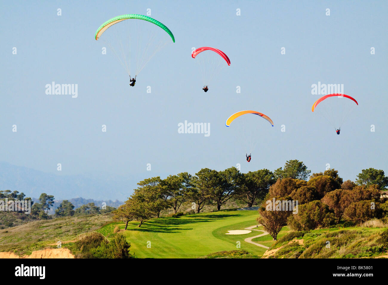 Paragliders soaring above Torrey Pines Golf Course-LaJolla, California, USA. Stock Photo