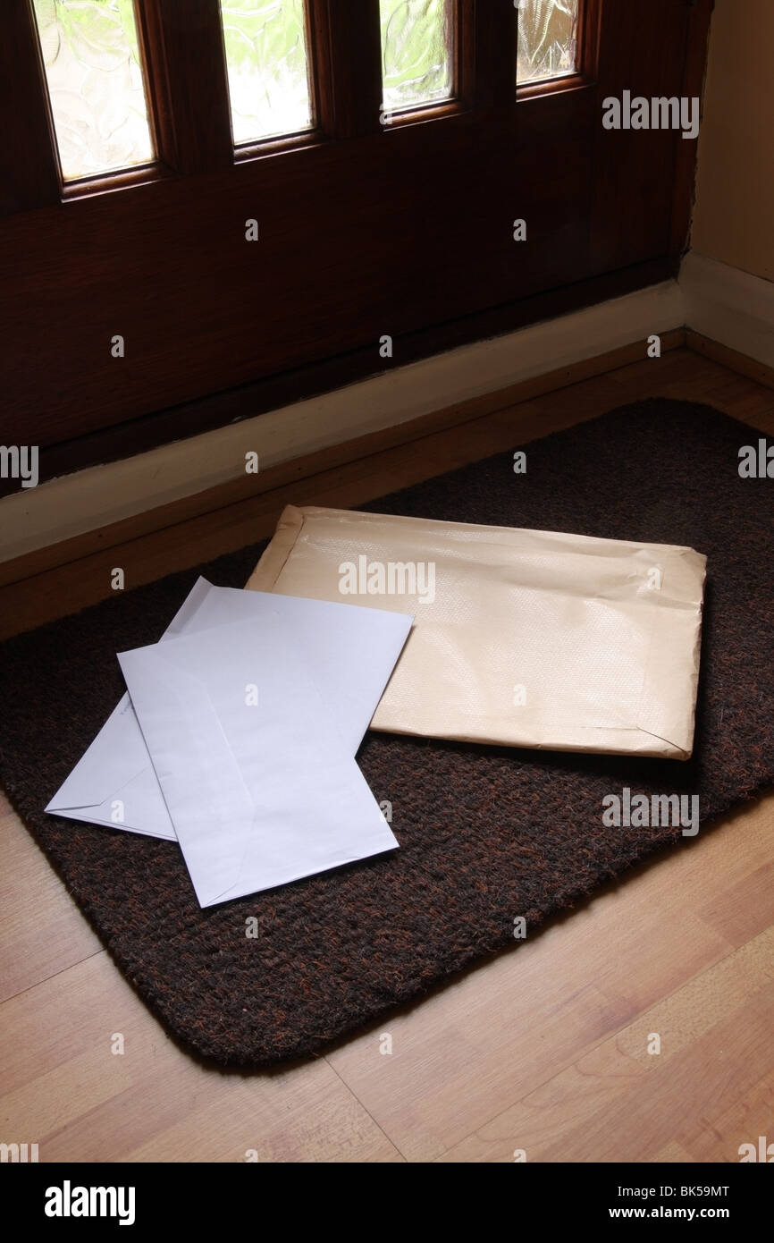 Envelopes, mail post, Christmas cards, on Christmas door mat Stock Photo -  Alamy