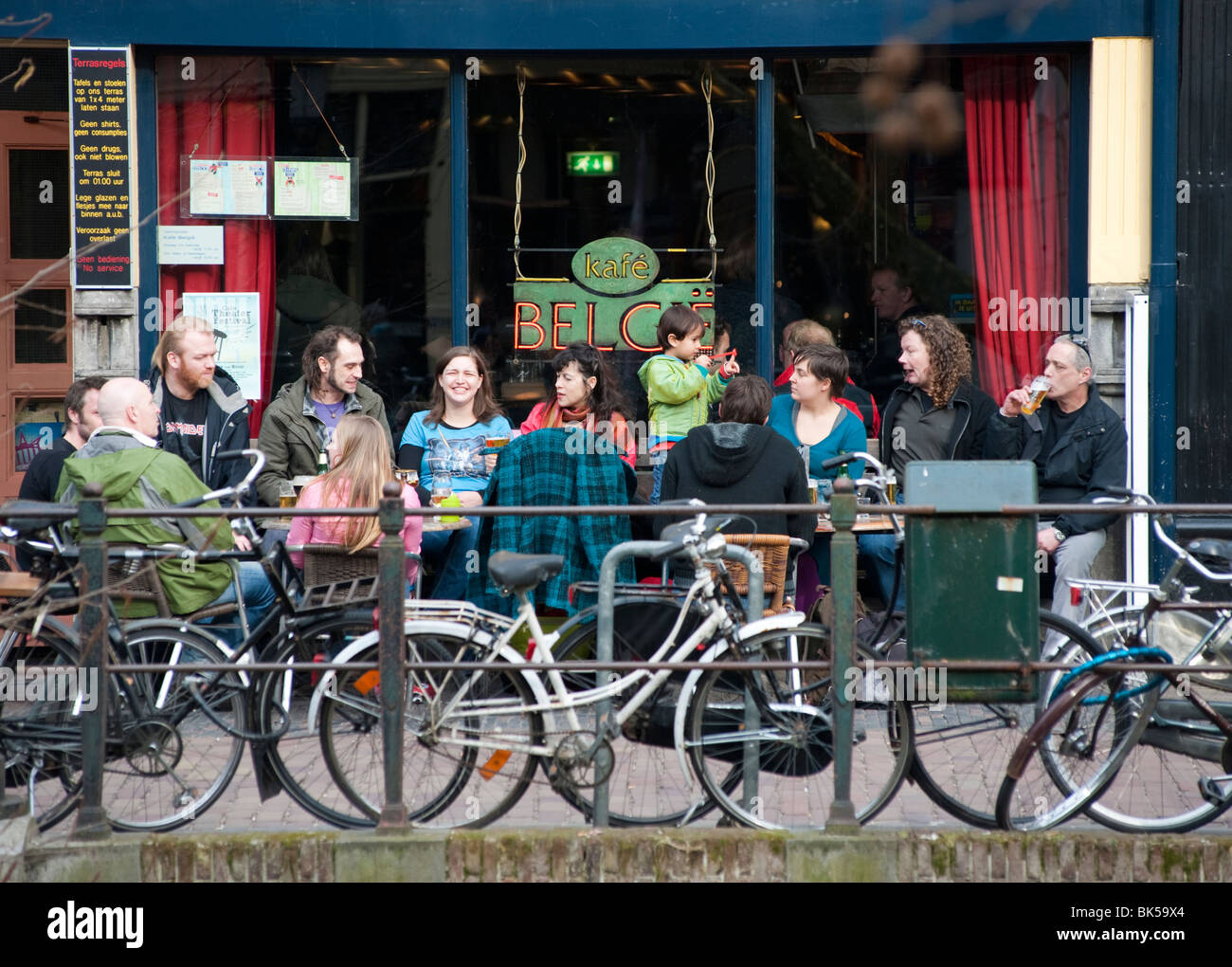 Busy bar beside canal in central Utrecht The Netherlands Stock Photo