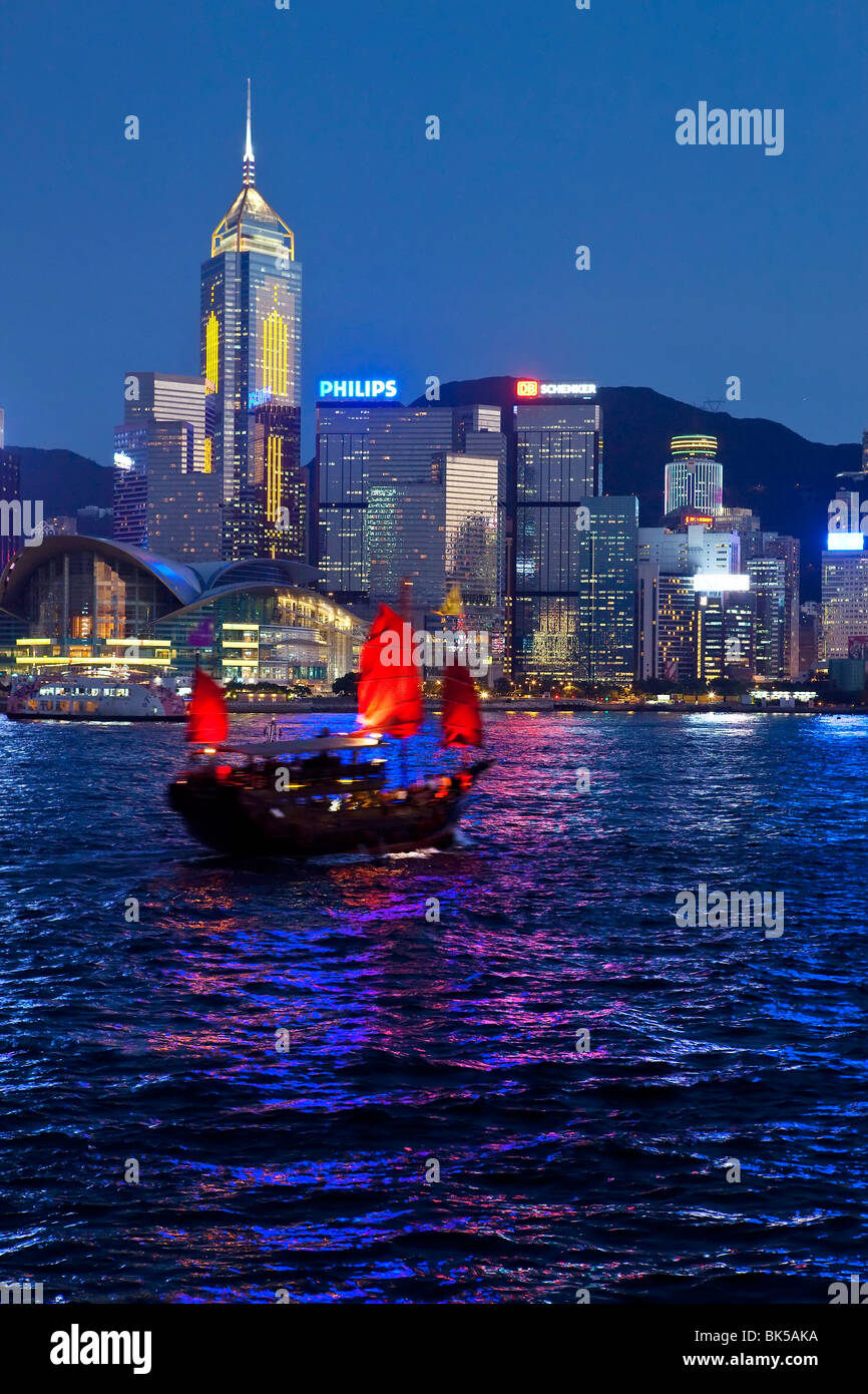 View from Kowloon of one of the last remaining Chinese sailing junks on Victoria Harbour, Hong Kong, China, Asia Stock Photo