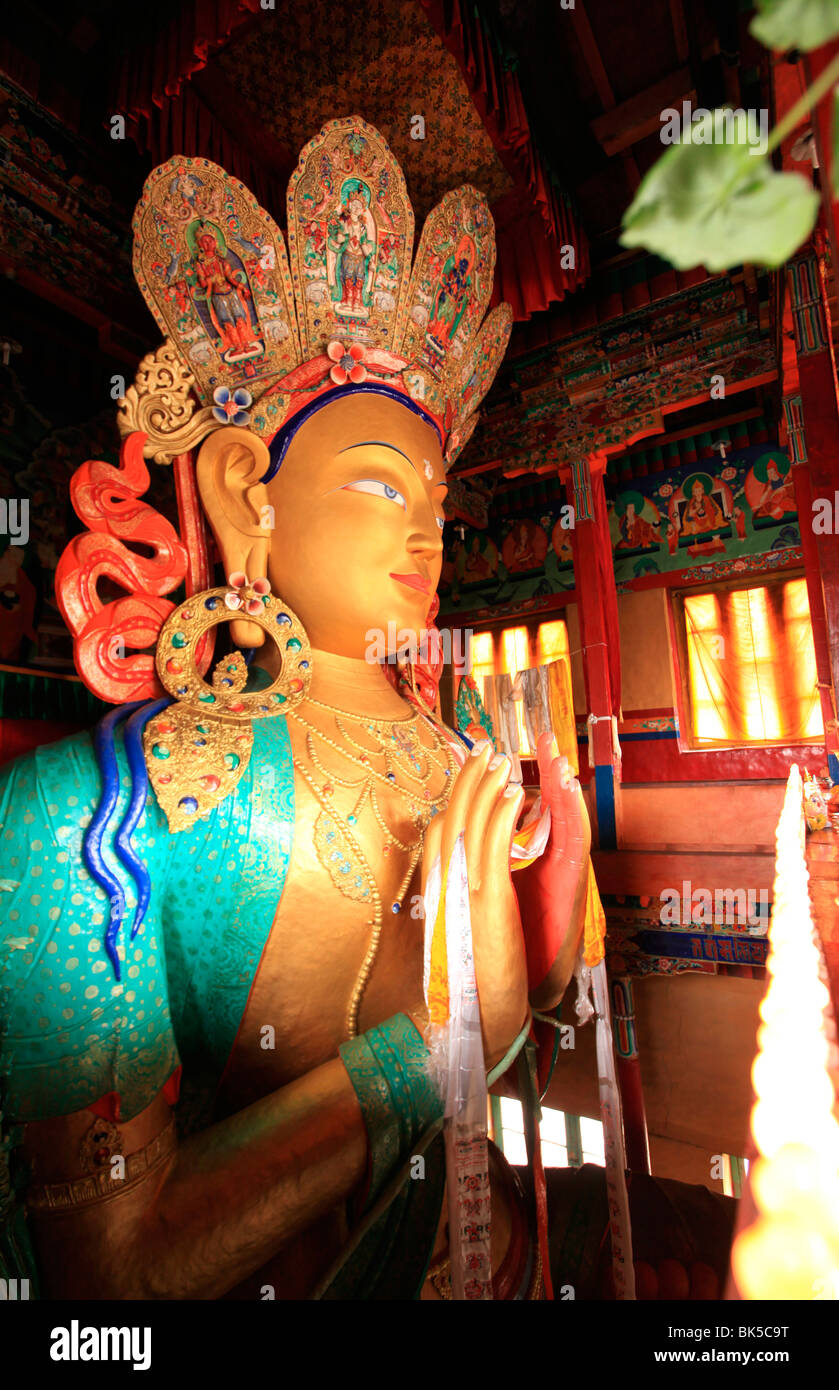 The huge 15 metre high statue of Maitreya (Chamba) Buddha, Thikse Gompa, near Leh, Indus Valley, Ladakh, India Stock Photo