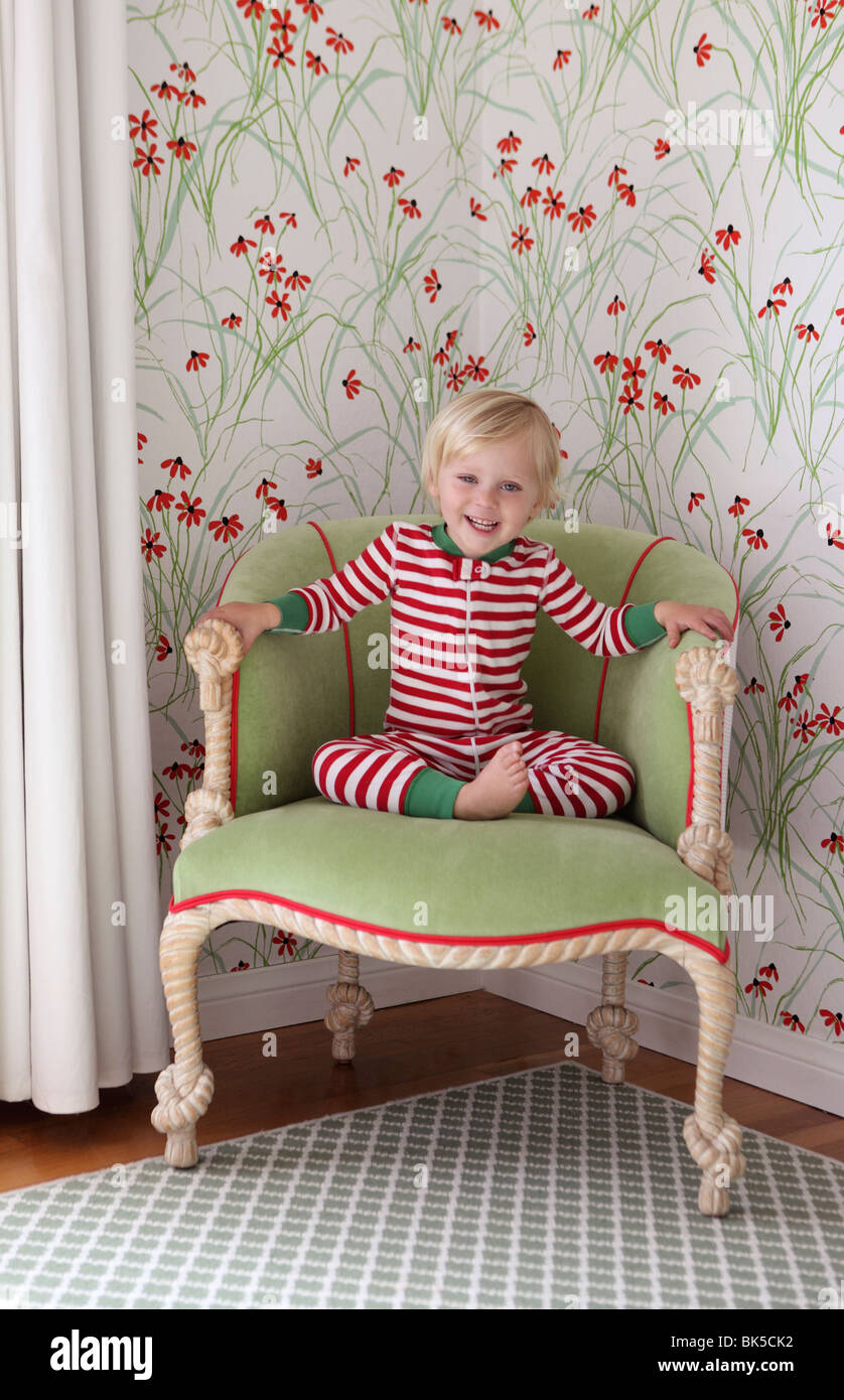 Little girl in red and white striped pajamas Stock Photo Alamy