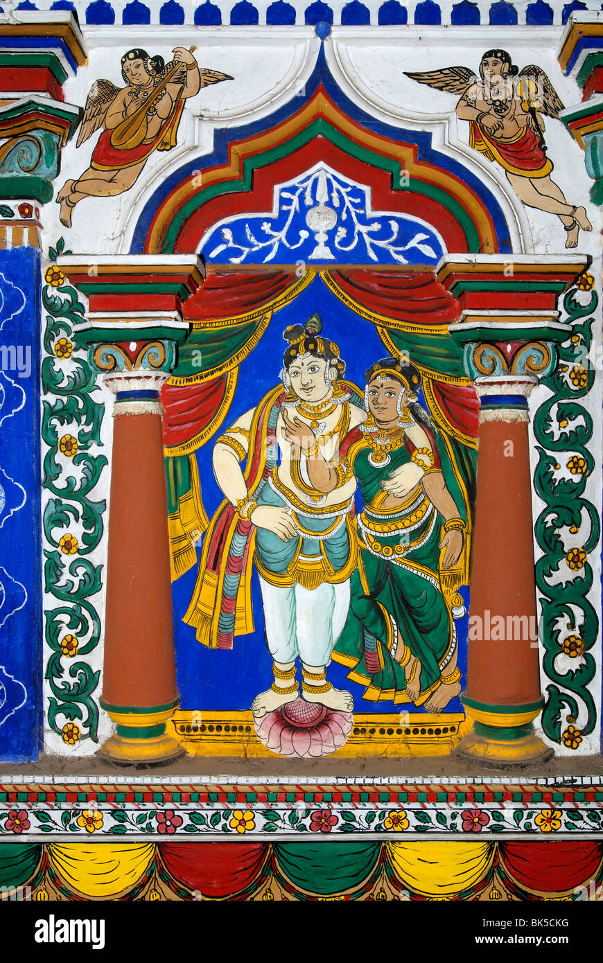 Lord Krishna with His consort Radha. 150 year old Mural (vegetable dye) and stucco work on the interior wall of the temple Stock Photo
