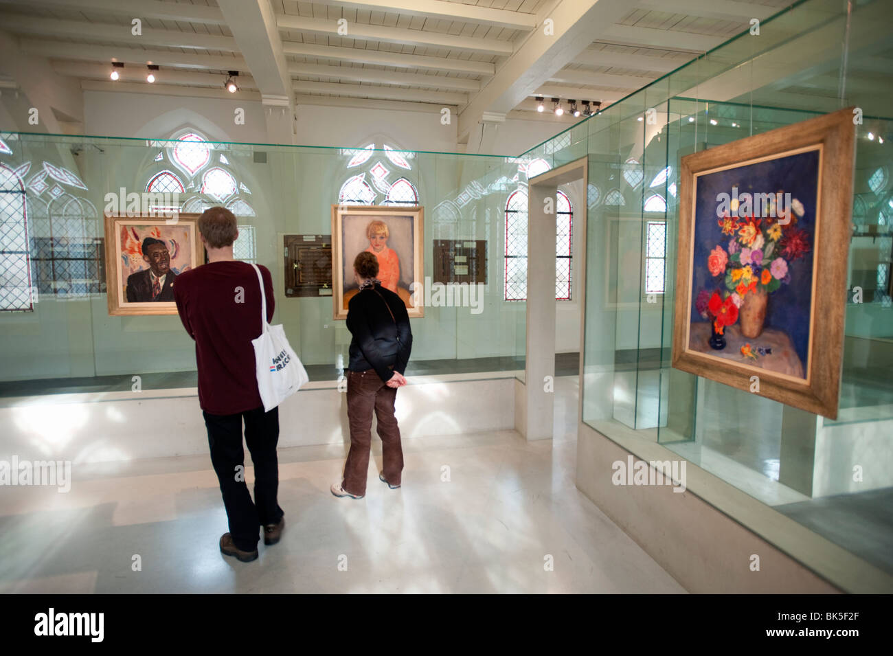 Visitors looking at paintings from van Baaren collection at Centraal Museum in Utrecht in The Netherlands Stock Photo