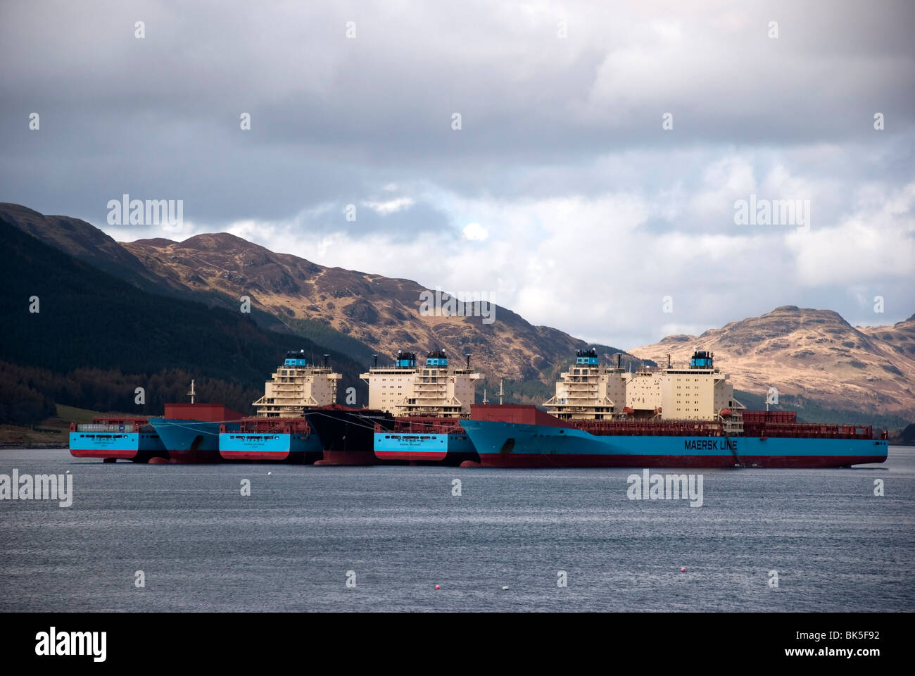 Six Mothballed Maersk Shipping Line Cargo Ships Stock Photo