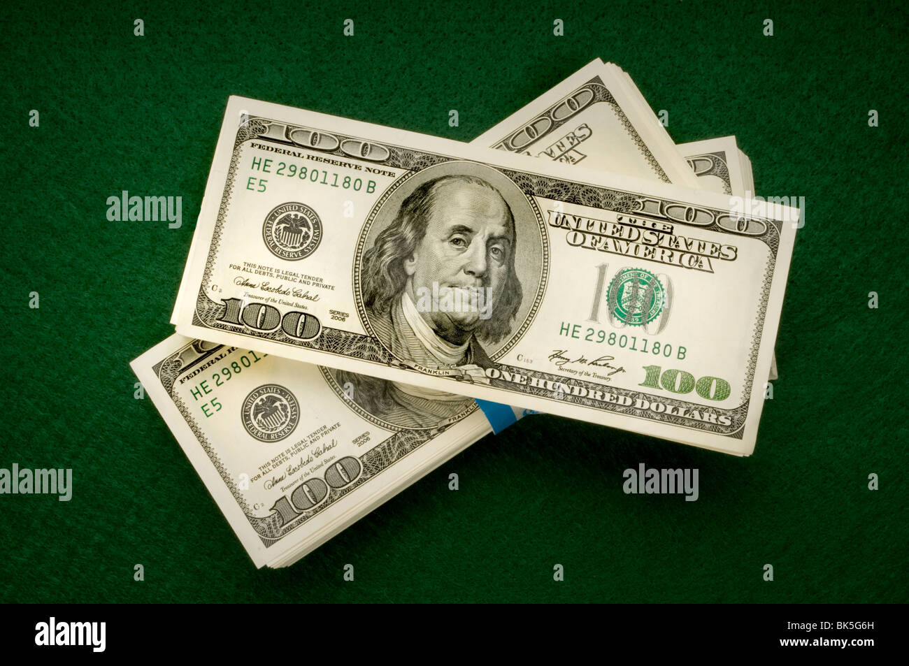 stack of American money on poker table Stock Photo