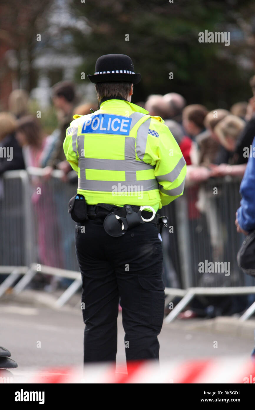 Police Officer on duty at an event, event control police enforcement.My  role involves building positive relationships with local Stock Photo - Alamy