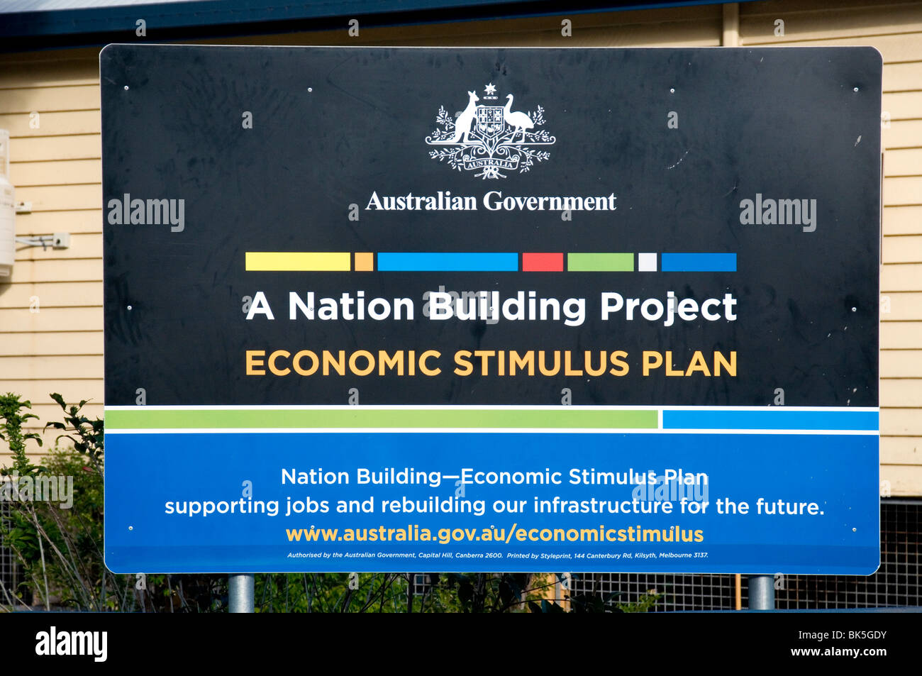 Sign outside a Queensland primary school announces works funded by the Australian government's 2008 Economic Stimulus Plan Stock Photo