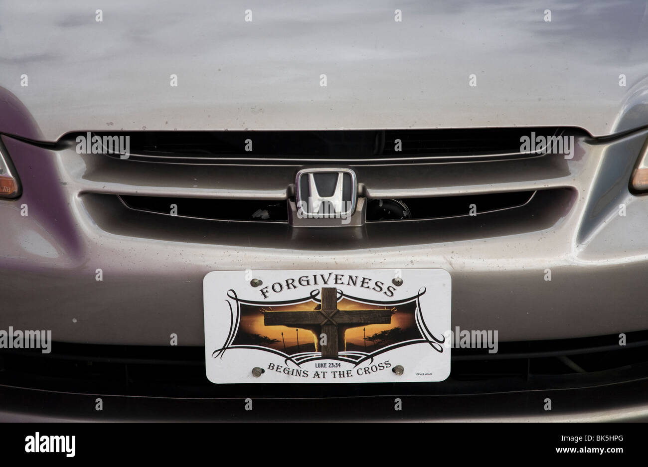 Begins at the Cross novelty license plate, Miami USA Stock Photo Alamy