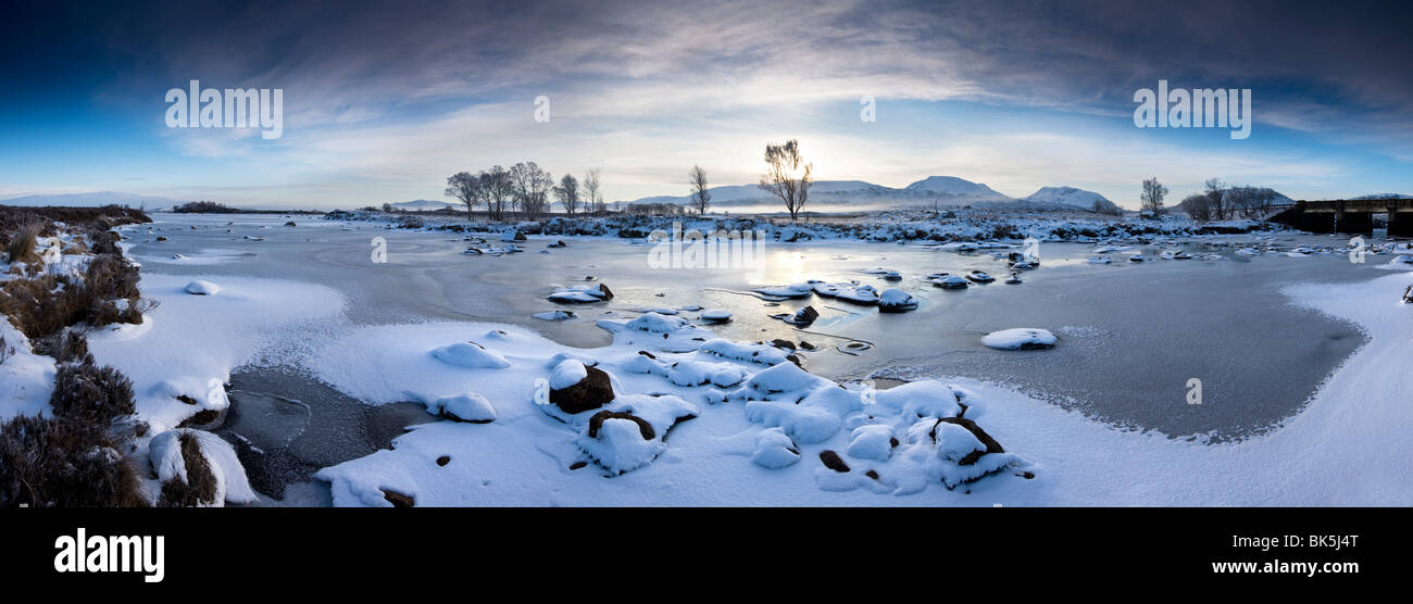 Panoramic winter view over frozen Loch Ba at dawn, Rannoch Moor, Highland, Scotland, United Kingdom, Europe Stock Photo