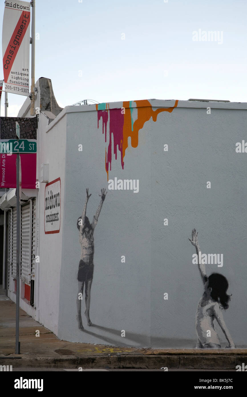 Mural children catching paint on hires stock photography and images