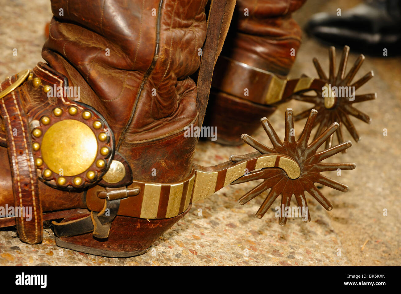 Western-style cowboy spurs on boots in Fort Worth, Texas Stock Photo