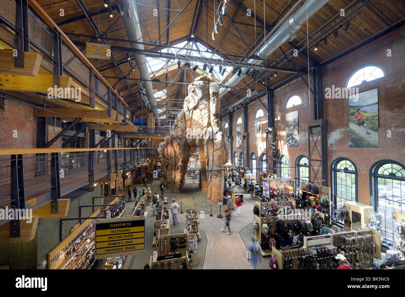 REI. Flagship R.E.I. store with indoor climbing wall. It is located in the restored 1901 Denver Tramway building. Denver Colorado. Stock Photo