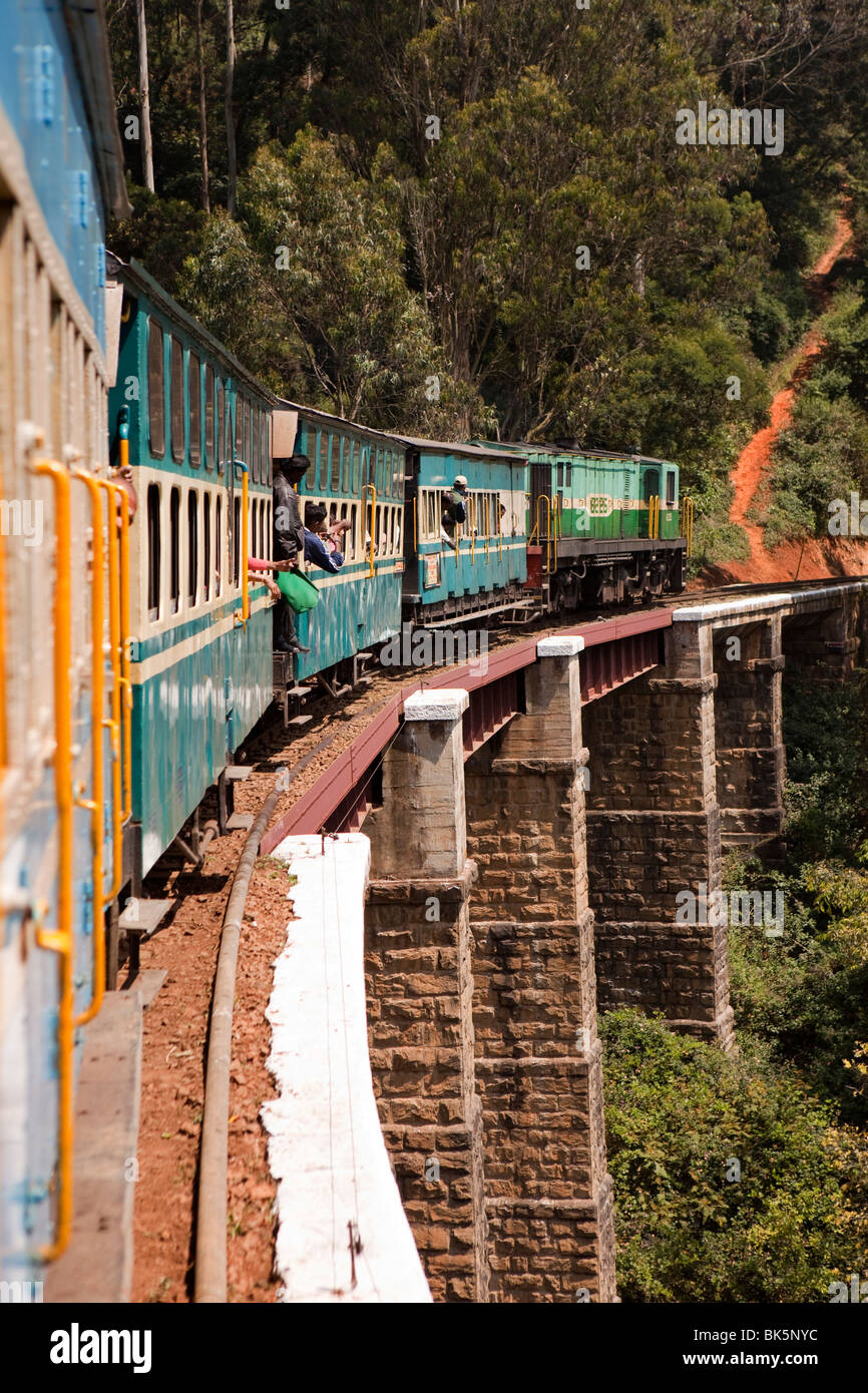India, Tamil Nadu, Udhagamandalam (Ooty), Nilgiri Mountain Railway rack train crossing Victorian era Stone Bridge Stock Photo