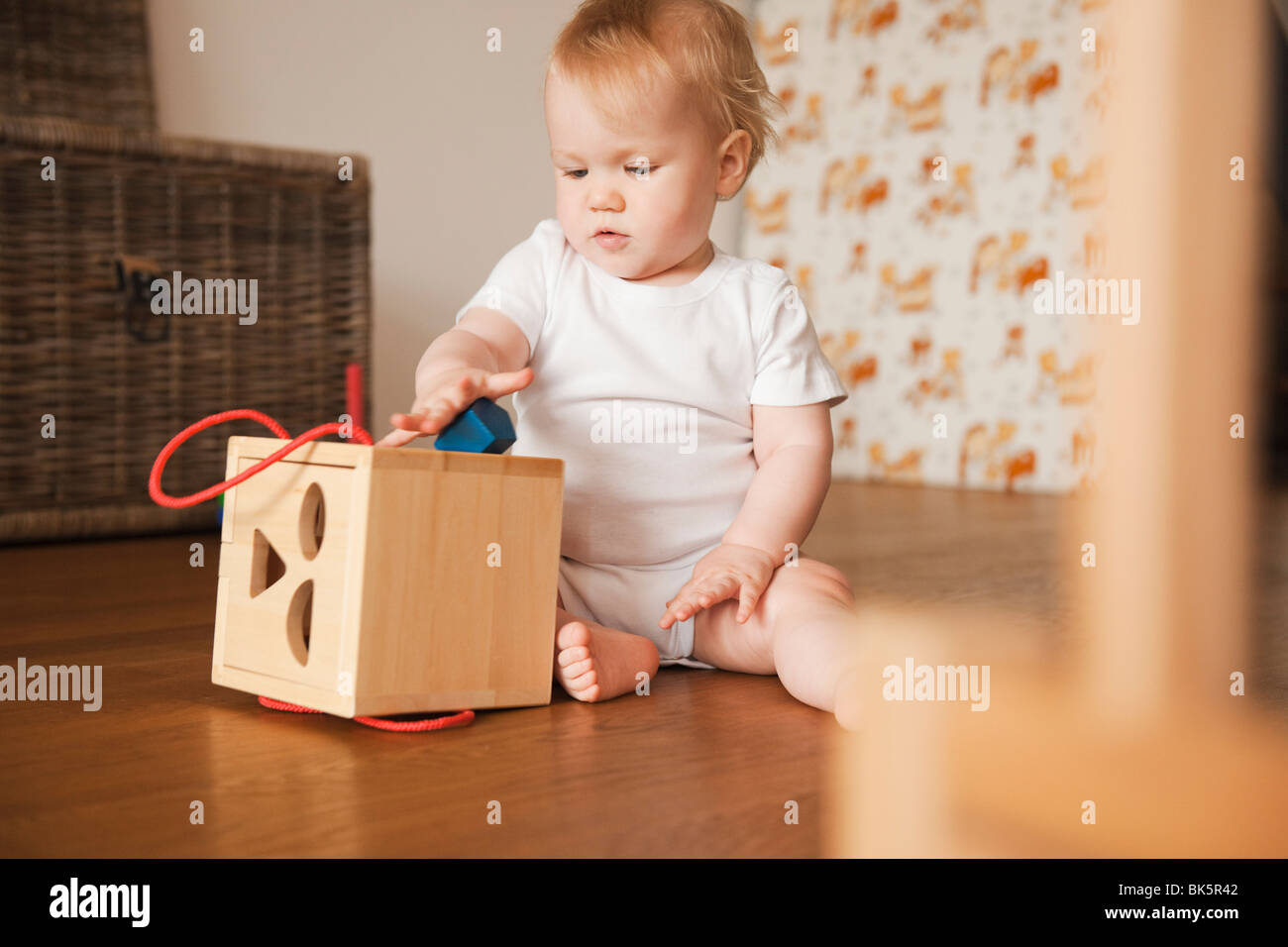 Baby Girl Playing with Shape Sorter Stock Photo Alamy