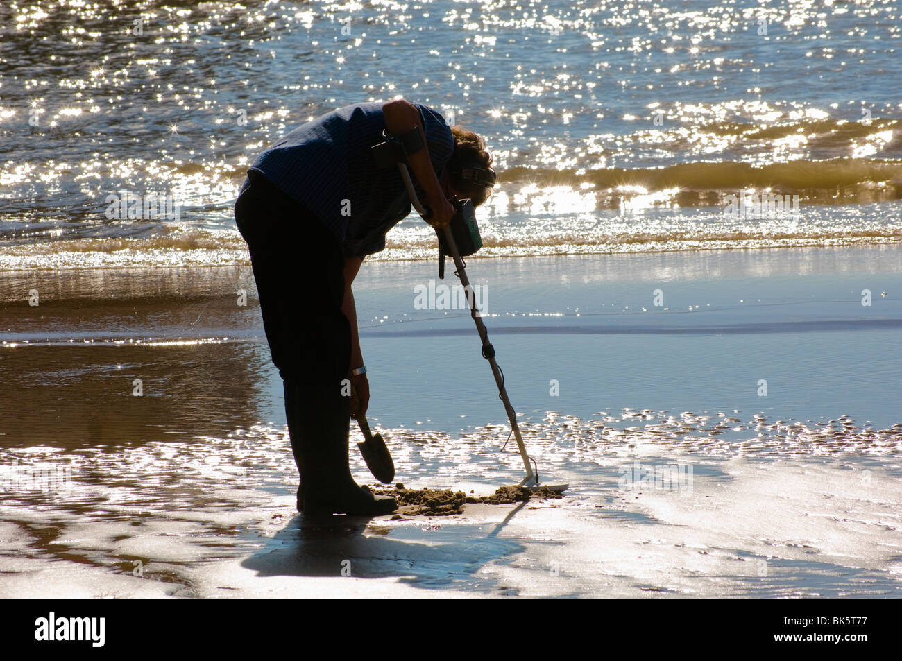 Man with metal detector hires stock photography and images Alamy