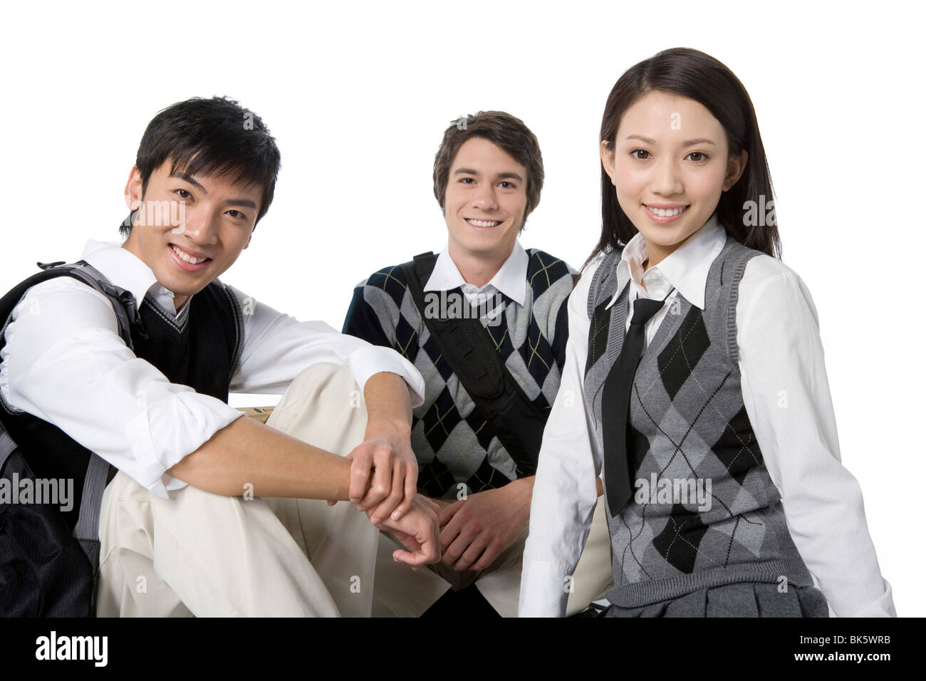 Students sitting on the floor Stock Photo - Alamy