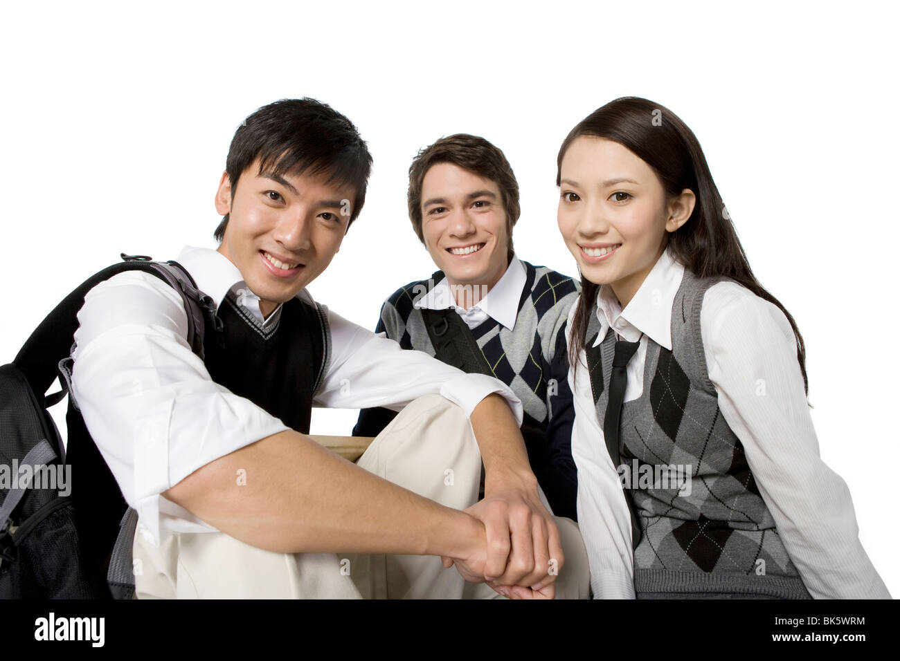 Students sitting on the floor Stock Photo - Alamy