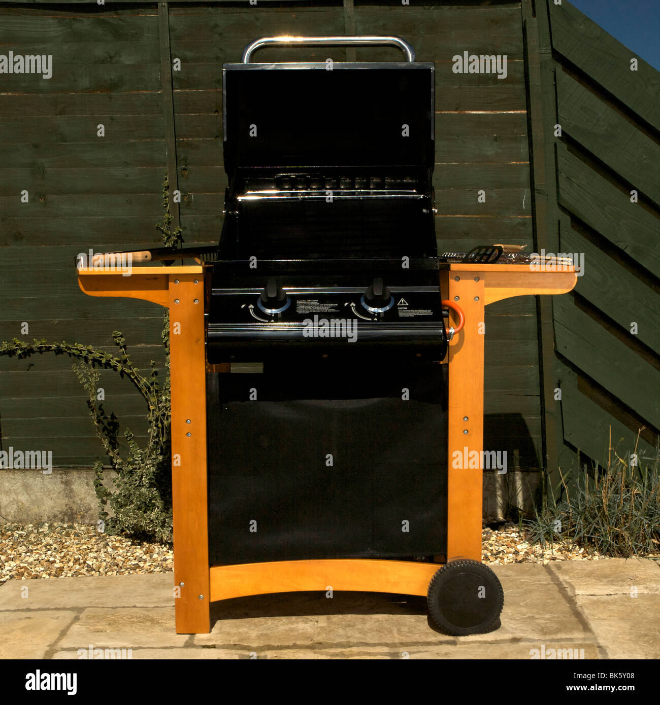 Standalone gas barbecue, barbeque, BBQ, in a garden environment on a