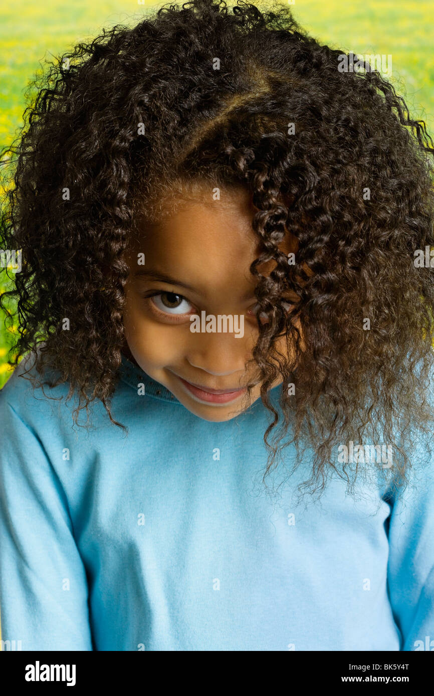 Short girl brown curly hair hi-res stock photography and images - Alamy