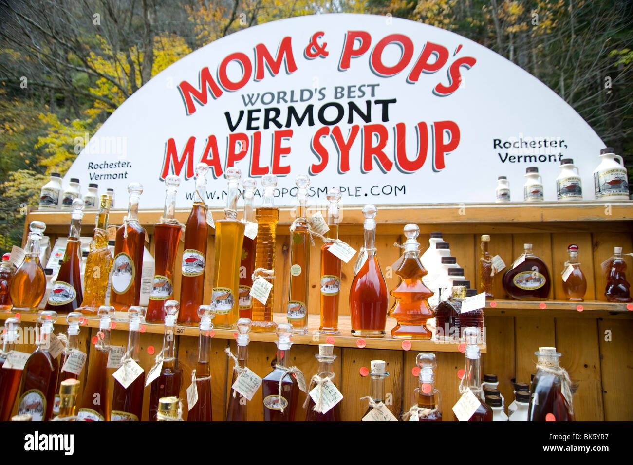 Bottles of maple syrup for sale at a roadside stand at Moss Glen Falls in Granville, Vermont, USA Stock Photo