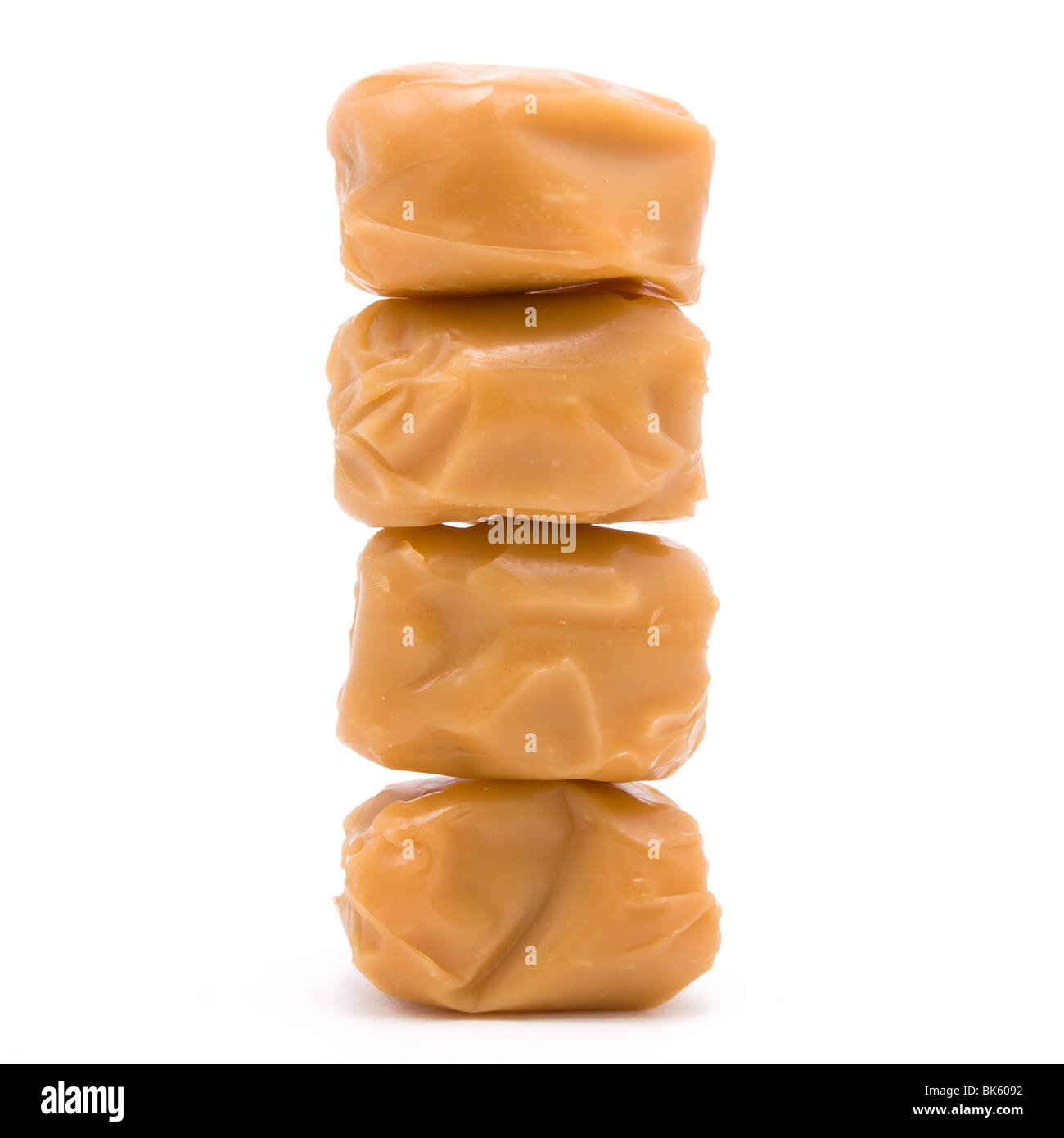 Chocolate filled Caramel toffee isolated against white background. Stock Photo