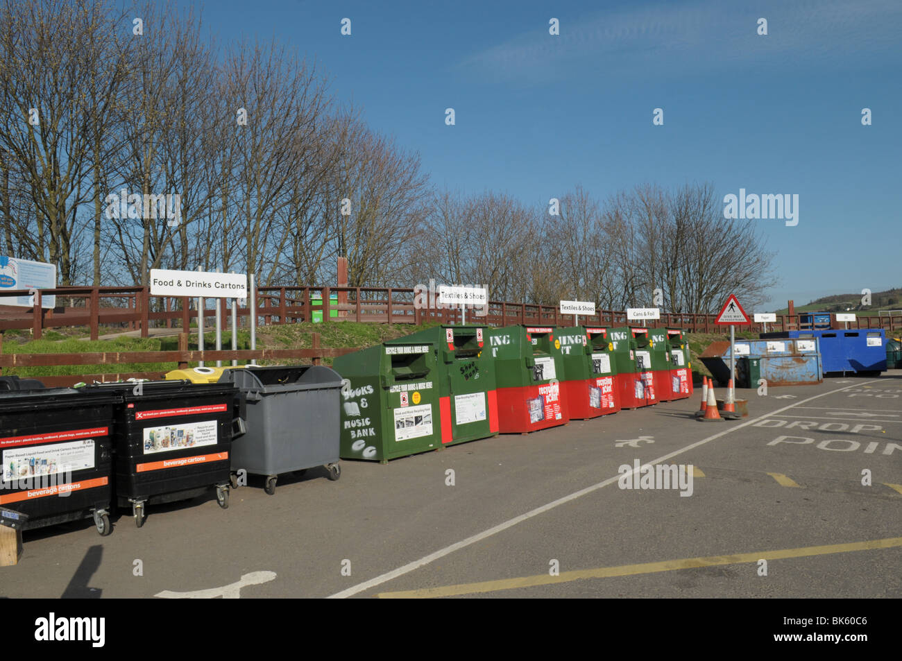 A bank of recycling bins at a recycling centre Stock Photo - Alamy