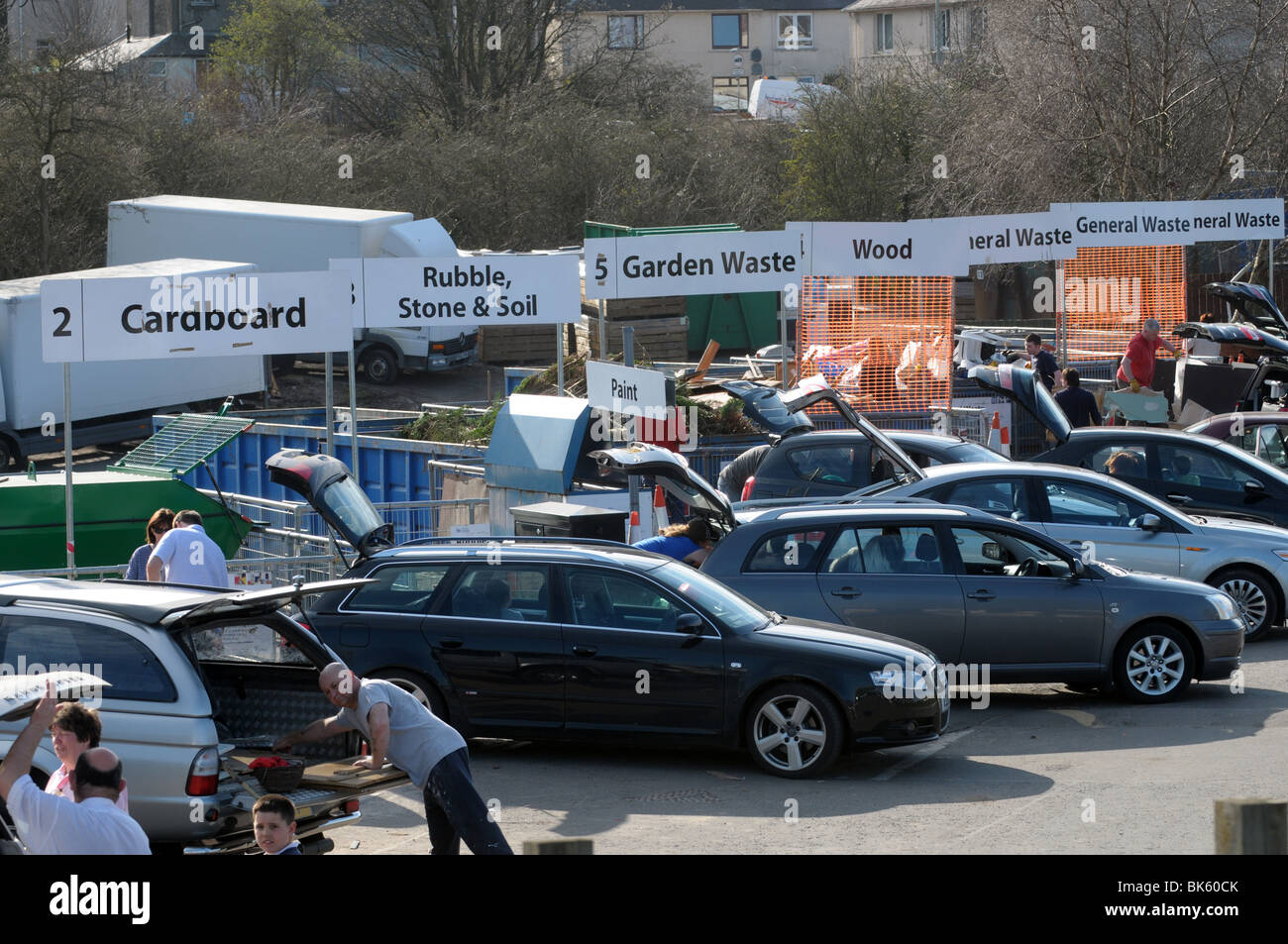 People dumping rubbish and waste at council recycling centre Stock