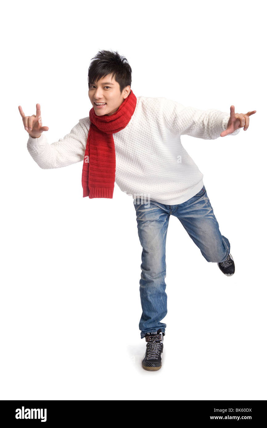 Young man in winter clothes Stock Photo - Alamy