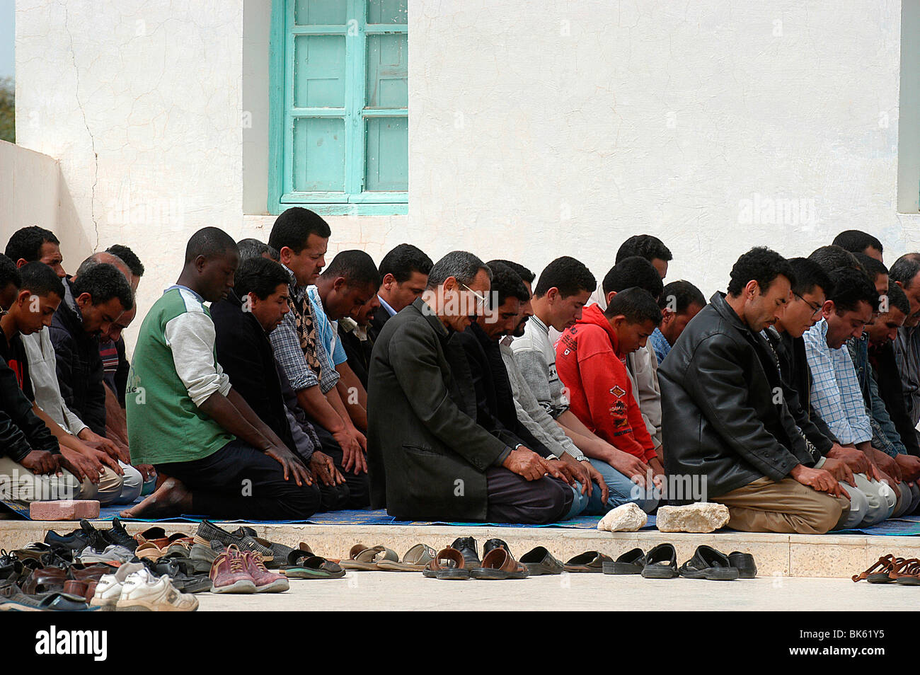 Tunisian Muslims at Friday prayers, Midoun, Medenine, Tunisia, North Africa, Africa Stock Photo