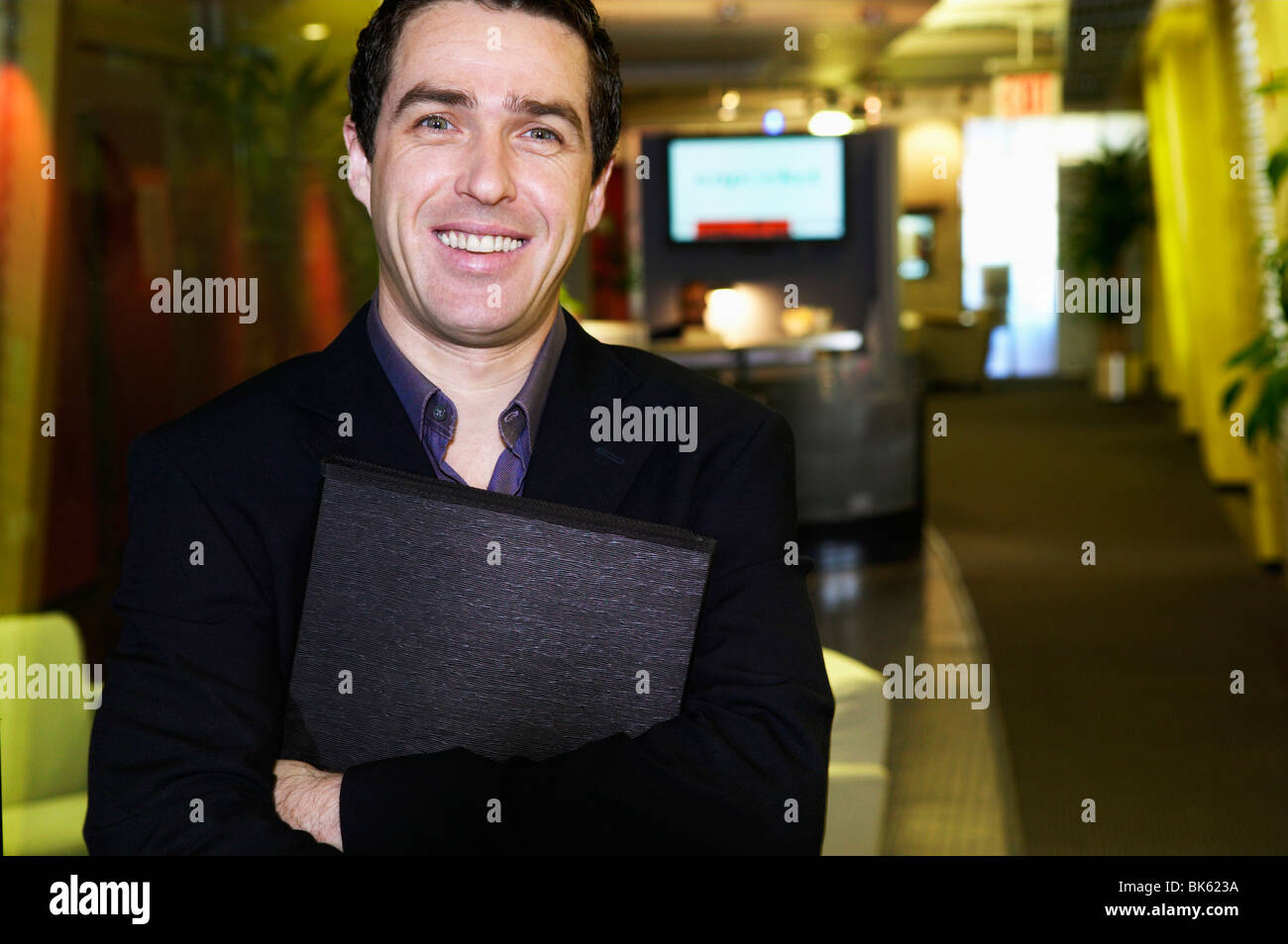 Portrait of a businessman smiling Stock Photo - Alamy