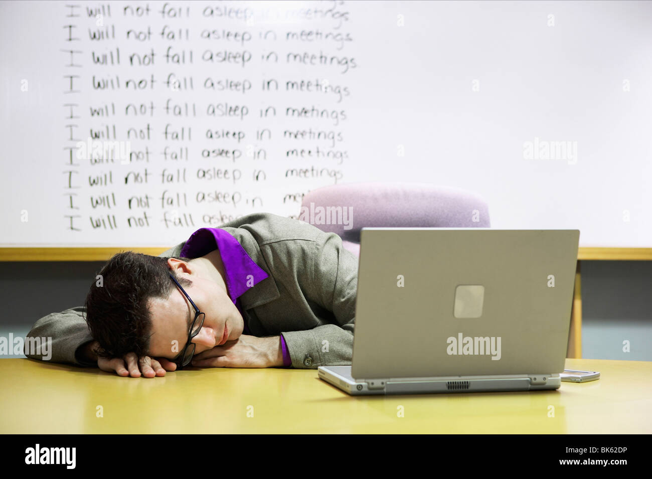 Image showcasing Businessman sleeping at a conference table Stock Photo - Alamy