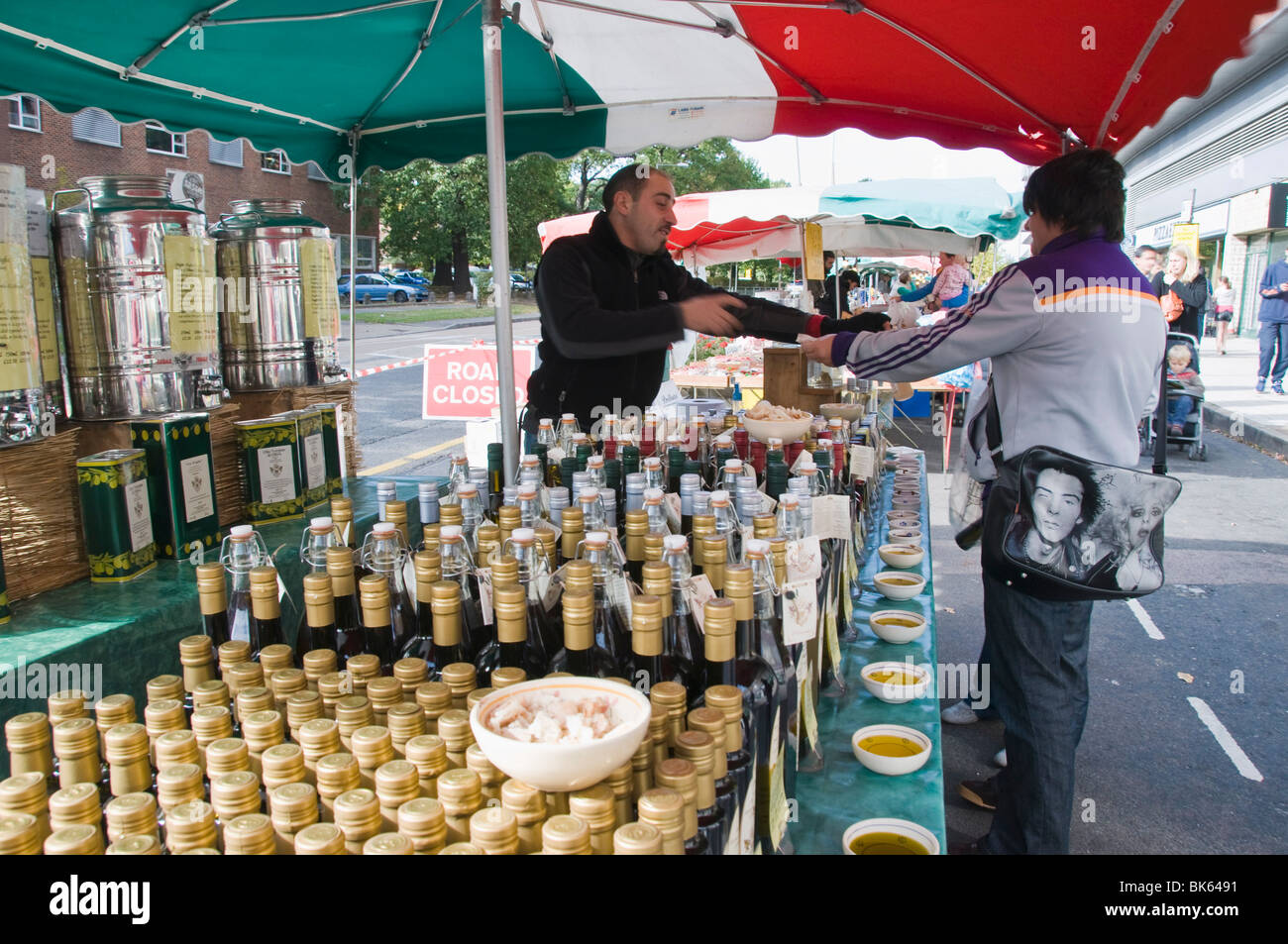 Olive oil stall at the Italian market at Walton-on-Thames, Surrey, England, United Kingdom, Europe Stock Photo