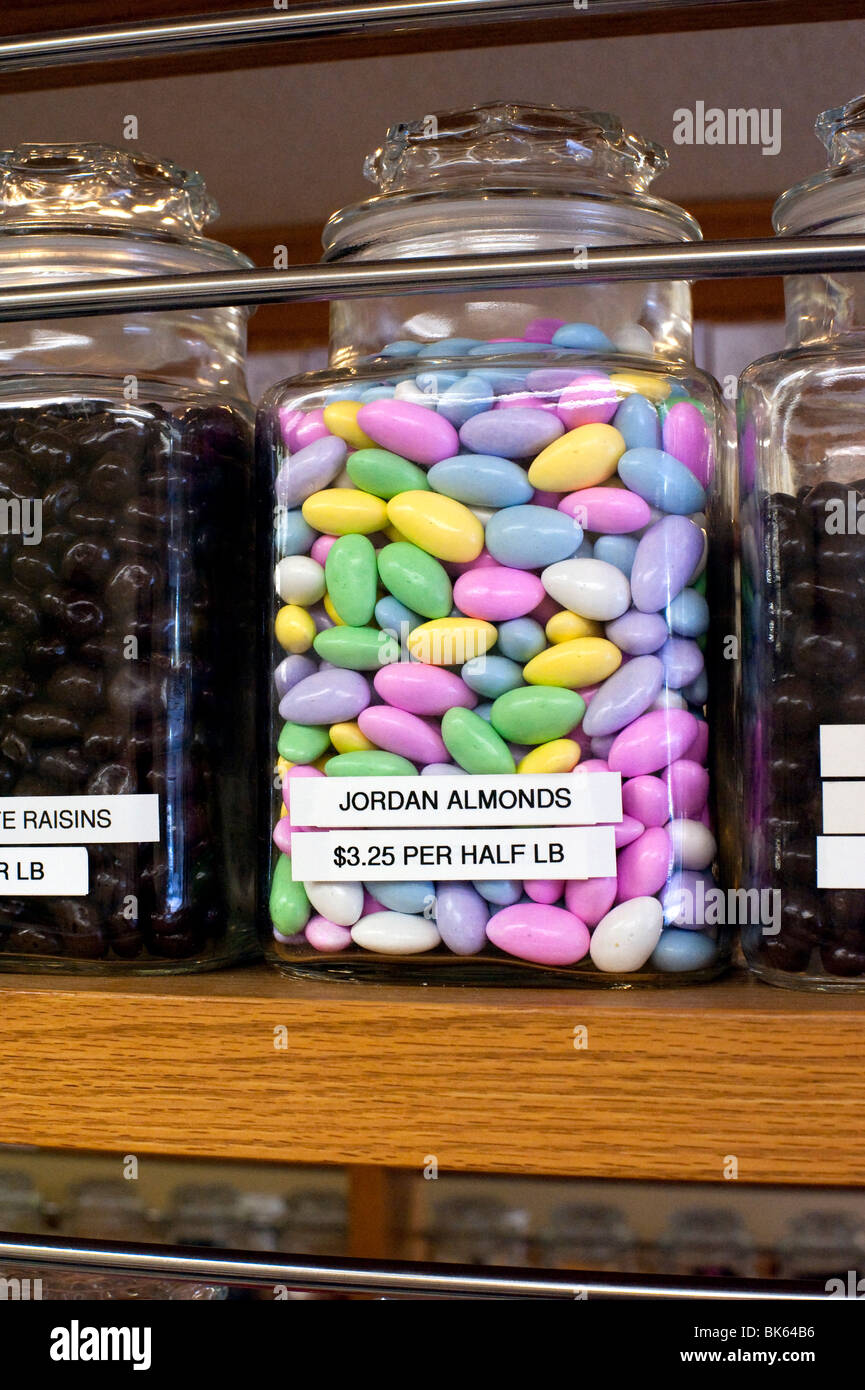 Candy jars on the shelves in a candy store Stock Photo Alamy
