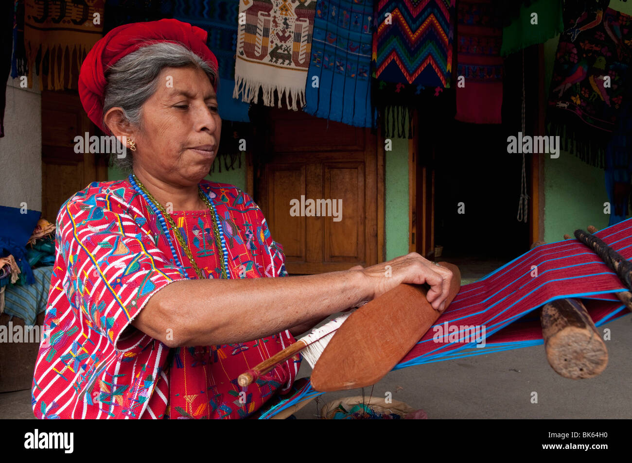 Woman weaving, Santa Catarina Palopo, Lake Atitlan, Guatemala, Central America Stock Photo