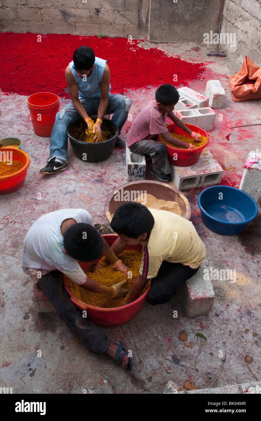 Making coloured sawdust for Holy Week Procession carpets, San Lucas Toliman, Lake Atitlan, Guatemala, Central America Stock Photo