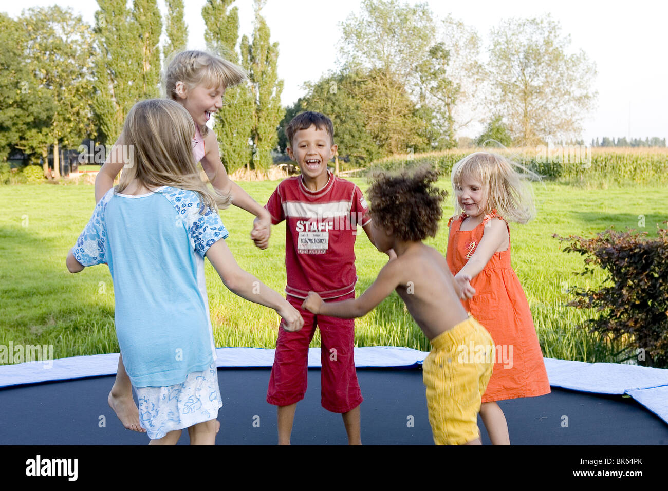 Kids on the trampoline hi-res stock photography and images - Alamy