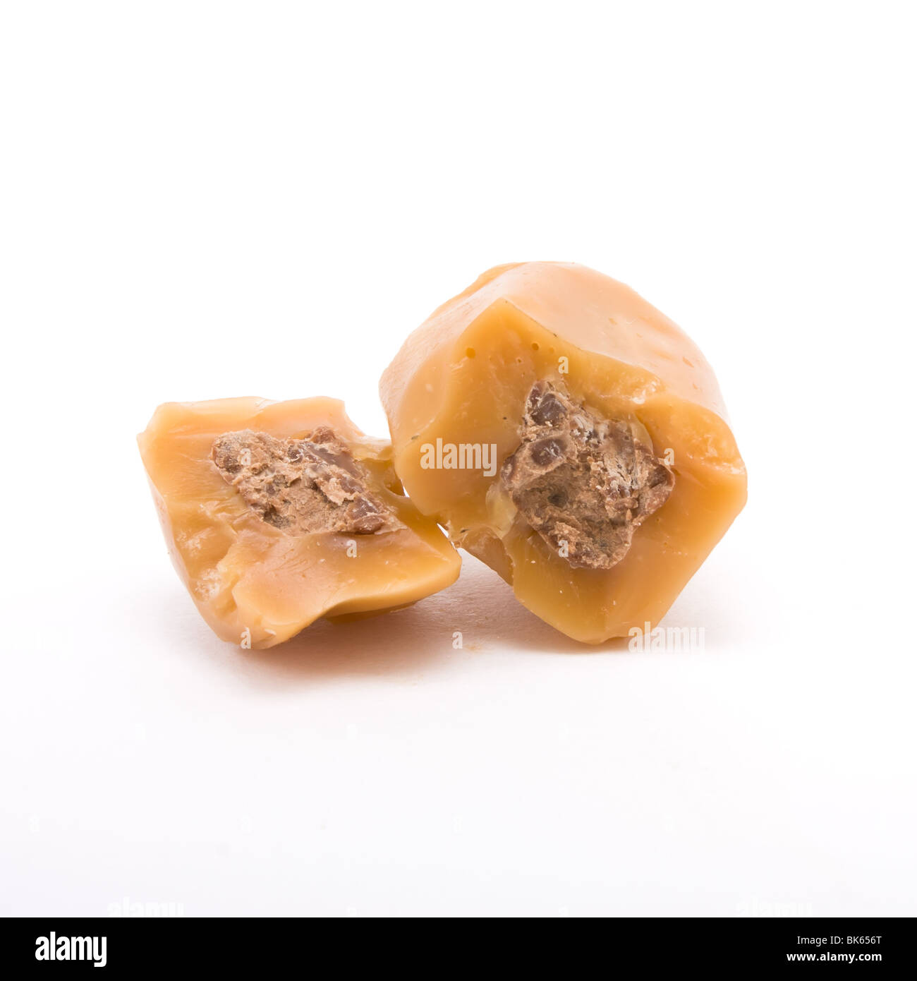 Chocolate filled Caramel toffee isolated against white background. Stock Photo